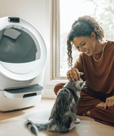 Whisker.com Litter-Robot 5 woman petting cat