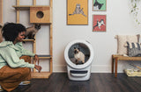 Women with cats using Litter-Robot 4