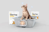 kitten in litter box with odortrap packs